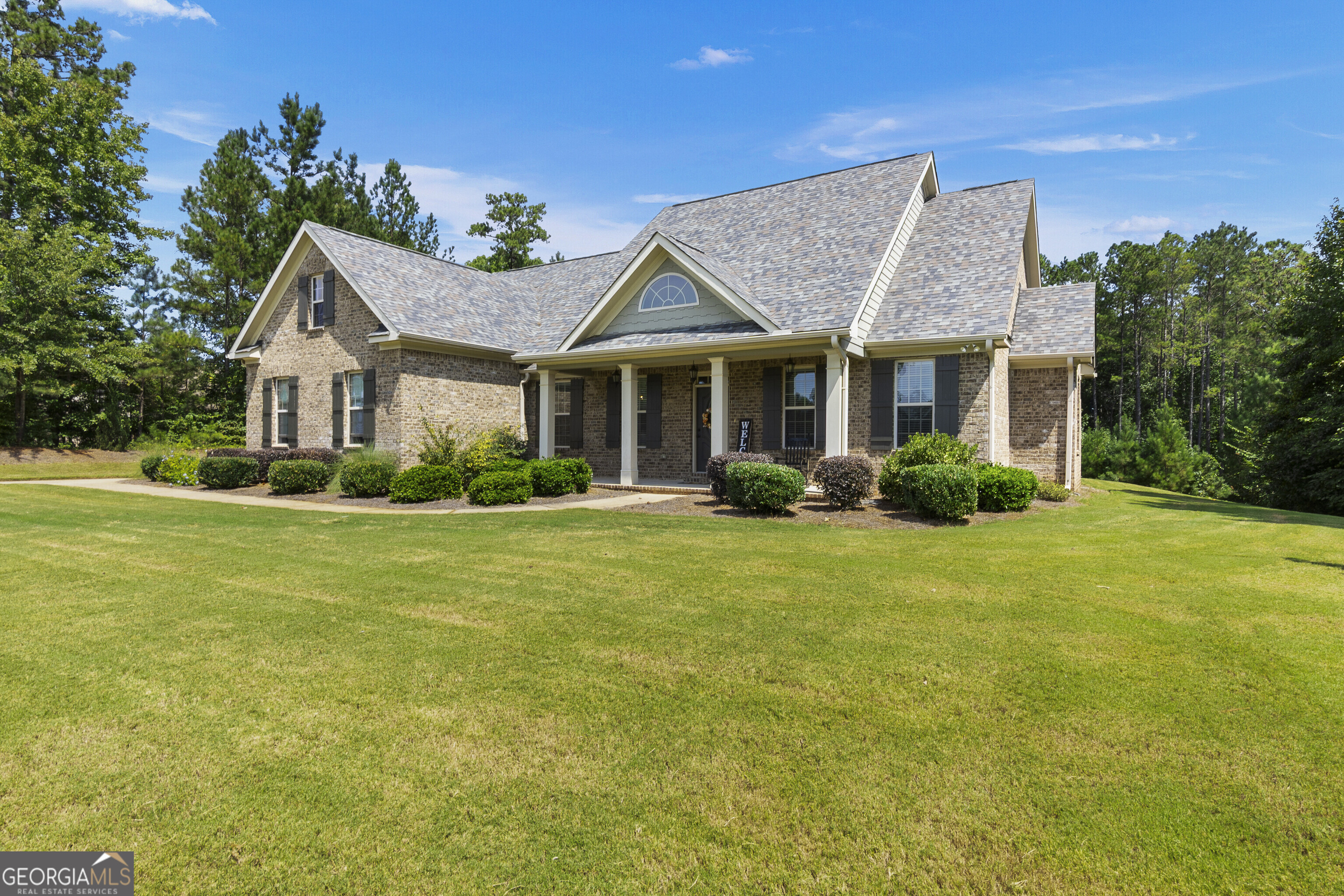 Brick Home in sought-after River Forest, a Monroe County gated golf course community. This 4 Bedroom 2.5 bath residence offers easy, low-maintenance living featuring an open floor plan and separate dining room. Split Bedroom plan wit spacious secondary bedrooms. The Screened back porch overlook a level backyard, perfect for outdoor enjoyment. Conveniently located near the front gate for easy access, this home has room for family & entertaining in a fabulous location. Minutes from I-75, and convenient to Forsyth, Macon and Atlanta.