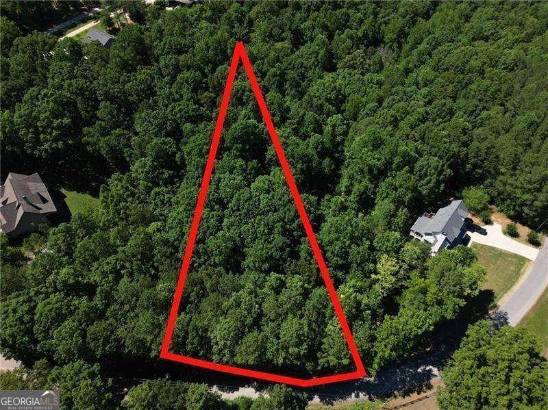2.01 acre tract in desirable North Paulding High School district. Ready to build your dream home or homes on this private stunning homesite. No HOA. Minutes to downtown Dallas, Cartersville, schools, and shopping. Zoned Residential. PERC Test and Survey available.