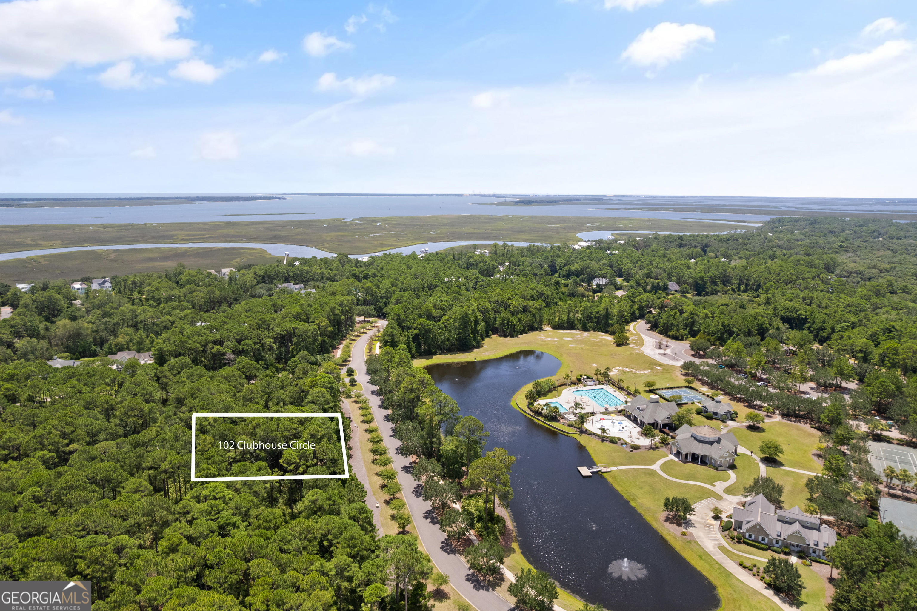 Prime .33-Acre Homesite in Sought-After Cumberland Harbour! Looking for the perfect spot to build your dream home in one of the area's most desirable communities? Look no further! This spacious .33-acre homesite is ideally located in the heart of Cumberland Harbour, directly across from the beautiful lake and the amenities center. You will be just steps from everything this vibrant community has to offer. Enjoy easy access to the community day dock, where you can fish or launch your kayak or paddleboard. Stay active with a swim in the resort-style pool, a workout in the state-of-the-art fitness center, or a game of pickleball with friends. Prefer a scenic ride? Hop on your bike and explore the lush tree-lined trails that wind through the neighborhood. This property is perfectly situated on Clubhouse Circle, offering picturesque views of the lake and clubhouse. As a bonus, the lot includes a DRB-approved house plan, site plan, and survey-a head start on building the home you've been dreaming of. Don't miss this opportunity to own a prime piece of real estate in one of the most beautiful and amenity-rich communities around!
