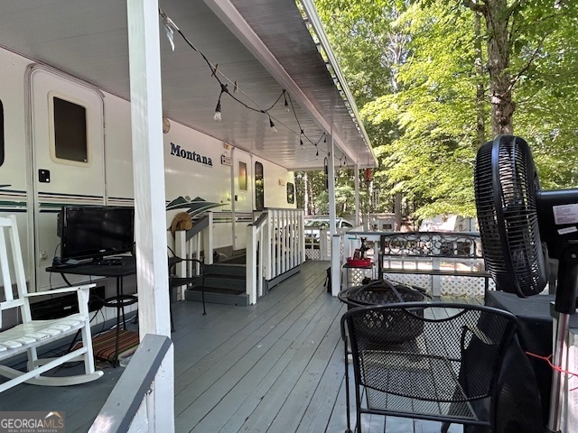 Sweetheart deal for Helen, Dahlonega, Cleveland, Near enough for A Vacation every Weekend. Pool, Playground, Trout stream just a walk to down to the trout stream. New flooring, Clean and ready for new owner. Large deck off porch for the outside grilling / fire pit, with enough room for guests. Large out building for the ones that always need space for the extra things you keep. Washer, Dryer, several local vineyards close by.