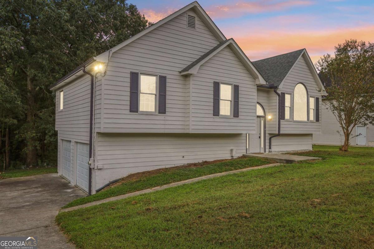 Great, raised ranch home in convenient location. Move right into this this 4 bedroom, 3 bath property. Large, level lot, and tons of yard space. Inside features a functional raised ranch floorplan with master on main, two additional bedrooms, and a bright family room. Basement offers finished space, and unfinished storage. Attached 2 car garage and large driveway with lots of parking. Easy access to both Hwy 61, Hwy 92, and 278. Convenient to schools, shopping, restaurants, and amazing local parks.