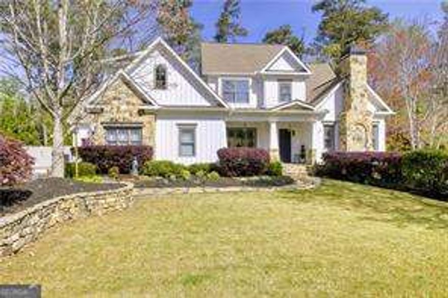 This immaculate executive home in beautiful Brookhaven is equipped with the most sought-after combination of features designed to deliver effortless indoor/outdoor living paired with elegance and sophistication throughout. An impressive sense of arrival with spacious driveway & motorcourt connects to a flagstone walk and leads to the main entry with covered front seating porch. The main level features a separate private office off the foyer, a dining room, a primary bedroom suite, a beautiful open-concept great room with fireplace and bookshelves, a gorgeous bright eat-in kitchen, a walk-in pantry and laundry room, and mudroom leading to the three garage bays (one of which is equipped with an EV charger). The great room features a 16' wall of glass with 8' sliding doors that open onto a screen porch equipped with a separate TV for the ultimate game-day occasions. The gourmet kitchen is equipped with all Wolf & SubZero appliances and is steps away from the outside cooking area and firepit. The upper-level offers four private bedrooms, three full baths, and one Jack-n-Jill. One of these bedrooms also serves as a second primary suite with extra-large closets and bath. The exceptional terrace level offers an unbeatable combination of spaces: a large family room/media space with stone fireplace, spacious game & dining areas, a home gym, an extra bedroom/full bath, a workshop with oversized access door, and generous storage spaces. Multiple French doors open onto a covered patio on the terrace level  and provide direct access to a lushly-landscaped private back yard. Garden features include elegant evening lighting, two pergolas with swing loungers, a firepit and fountain sculpture, all of which help create the perfect setting for quiet relaxation or superb entertaining. Pool possible! Yard already surveyed with multiple options for several alluring pool designs! Immaculately maintained and presented, and located in a wonderful walkable & serene neighborhood setting. Exceptional proximity to shopping, recreation, entertainment and healthcare. Comprehensive third-party homebuyer warranty included covering electrical, plumbing, HVAC as well as all mechanical systems and appliances.