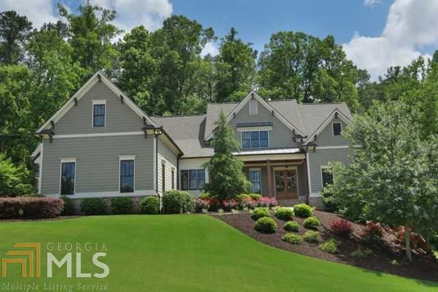 Stunning Executive home featuring 5 bdrm/5 full baths/2 half baths has spectacular upgrades including coffered & beamed ceilings, stacked stone fireplaces & custom cabinetry. Warm & welcoming front porch invites you into the foyer w/gleaming hardwoods. Fireside family & fireside keeping room have expansive views of private backyard. Boasting a large maser on main w/opulent spa bath. Expansive secondary bdrms w/private baths & upstairs bonus room, 3 car garage and office are additional features of this lovely home. Unfin basement w/safe room await your finishing touches.