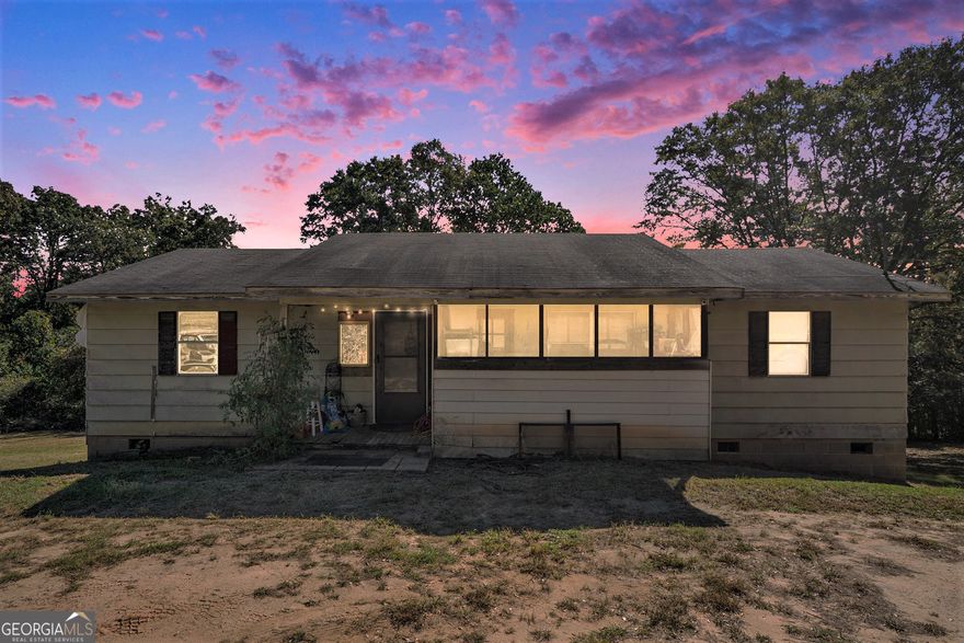 Endless potential on 8.62 beautiful acres. This one-owner ranch home features a split-bedroom floor plan and is ready for your personal touch - a true fixer-upper with great bones. The property includes a year-round creek, perfect for nature lovers or outdoor enthusiasts. A storage building near the creek adds extra functionality and charm. Whether you're looking to renovate, build, or invest, this scenic property offers peace, privacy, and opportunity.