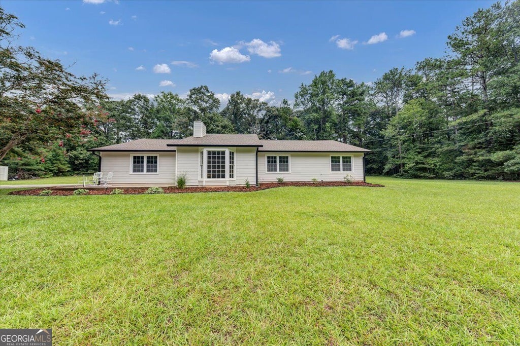 Photo of 120 Creekwood Lane, Fayetteville, GA 30214 (MLS # 10850553)