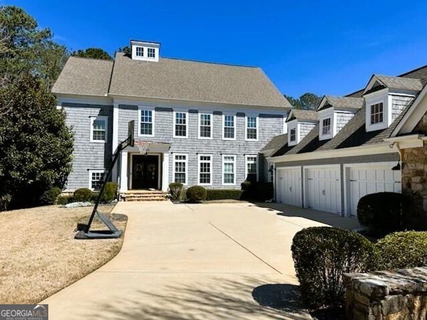 Enjoy the best that East Cobb has to offer! Breathtaking 6 bed / 6.5 bath home nestled in an exclusive 5-home community in Top Ranked POPE HIGH SCHOOL district. This residence offers a true outdoor oasis with a heated saltwater POOL, spa, and breathtaking LAKE VIEWS. Entertain around the FIRE PIT, relax on the lower patio, or enjoy the SCREENED-IN PORCH. Step inside to an immaculate home that showcases thoughtful attention to detail at every turn. The Family room features coffered ceilings, custom built-ins with shiplap accents, and a gas log fireplace. The gourmet kitchen opens to the Family Room and is equipped with brand NEW, top of the line JENN-AIR PROFESSIONAL STYLE APPLIANCES, including a 48 inch, 6-burner gas range with griddle and double ovens, a Built-in Luxury 48-inch Jenn Air Refrigerator, plus matching drawer microwave and dishwasher. The EXPANSIVE CENTER ISLAND and features quartz countertops with new designer pendant lighting. The breakfast area can hold a banquet sized dining table and offers serene lake views. Additional features include a pantry with built-in wood shelving, a tiled MUDROOM with storage cubbies plus two built in "homework" desks and a butler's pantry with quartz countertops and shiplap accent wall. The Main Level features a private Guest Suite with Full Bath which could also be used as a Home Office. Retreat to the PRIMARY SUITE ON THE SECOND LEVEL that boasts a spa-like bathroom with his and hers vanities, a soaking tub, and an oversized seamless glass shower. The walk-in closet with custom shelving system is super spacious and has a separate entry to the Laundry Room. ALL BEDROOMS FEATURE PRIVATE BATHS and Built-in closet shelving systems. New seamless glass shower doors have just been installed in every bathroom. The TERRACE LEVEL IS FULLY FINISHED with a Large Media room, Guest Suite with Full bath, Storage Room and Home office. The owner has recently added new engineered hardwood floors thru out the terrace level plus brand-New custom built-ins in the Media Room and also added a custom dry bar area with a Jenn Air wine fridge and quartz countertops. The three-car garage features a bonus room, perfect for an office, gym, or extra storage. Exterior updates include professional lighting with timers, a professional drainage system, and an irrigation system. The Five Lakeside community fee covers landscaping for both front and backyards and boasts its own PRIVATE PARK for homeowners, providing an ideal space for relaxation and recreation. Residents can also enjoy fishing on the stocked lake. Swim/Tennis memberships available at neighboring "Twin Lakes Subdivision"