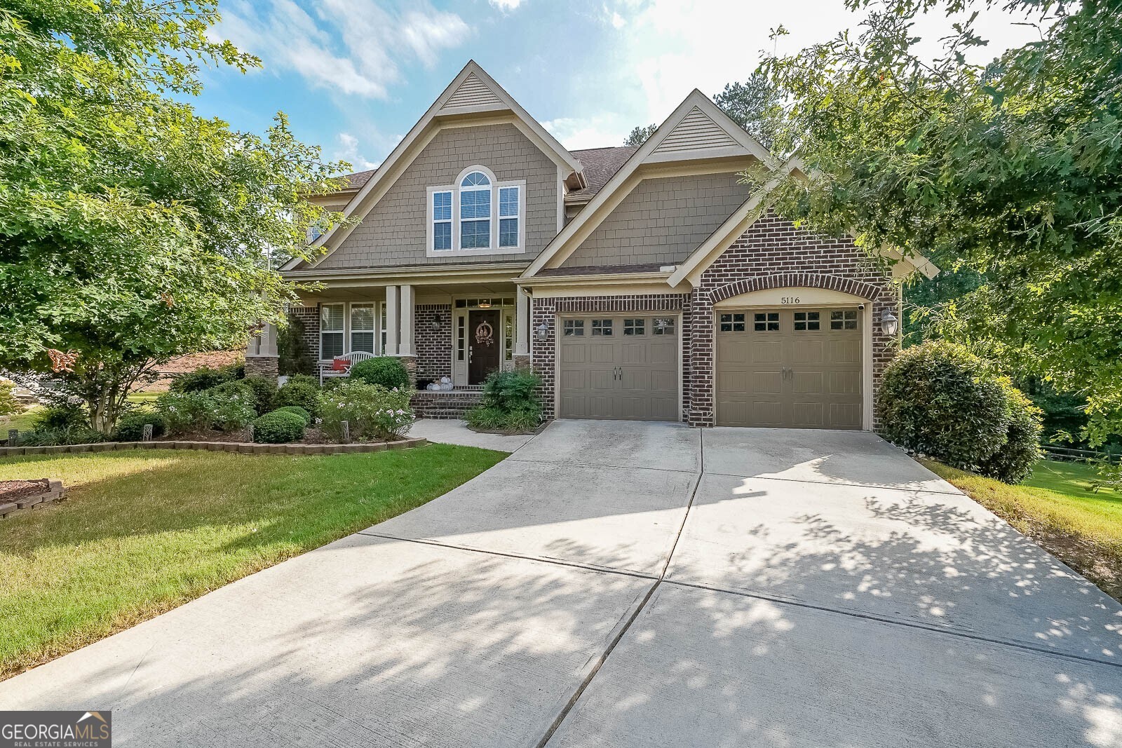 Luxury Meets Lifestyle in West Oaks! Welcome to 5116 Barton Pass, where upscale design, thoughtful upgrades, and a perfect Cobb County location come together beautifully. This 5-bedroom, 4.5-bath home is truly special impeccably maintained and loaded with custom details that make it feel like a model home. From the moment you walk in, you'll notice gleaming hardwood floors, and a two-story great room filled with natural light. The open-concept kitchen is a showstopper with granite countertops, tile backsplash, stainless appliances, a five-burner gas cooktop, tons of cabinetry! The luxurious primary suite is a true retreat with a sitting area, spa-inspired bath, and a fabulous walk-in closet with his-and-her sides. Upstairs, you'll find generous secondary bedrooms The finished terrace level with Kitchen/Bar and full bath is ideal for entertaining, media room or perfect in-law suite! Outside, enjoy your own backyard oasis with the perfect cup-de-sac lot perfect for football, pets, or playtime. Located on a quiet cul-de-sac in West Oaks Enclave, just minutes from Lake Allatoona, Allatoona Creek Park, trails, top-rated schools, shopping, and dining this home checks every box. Welcome Home!