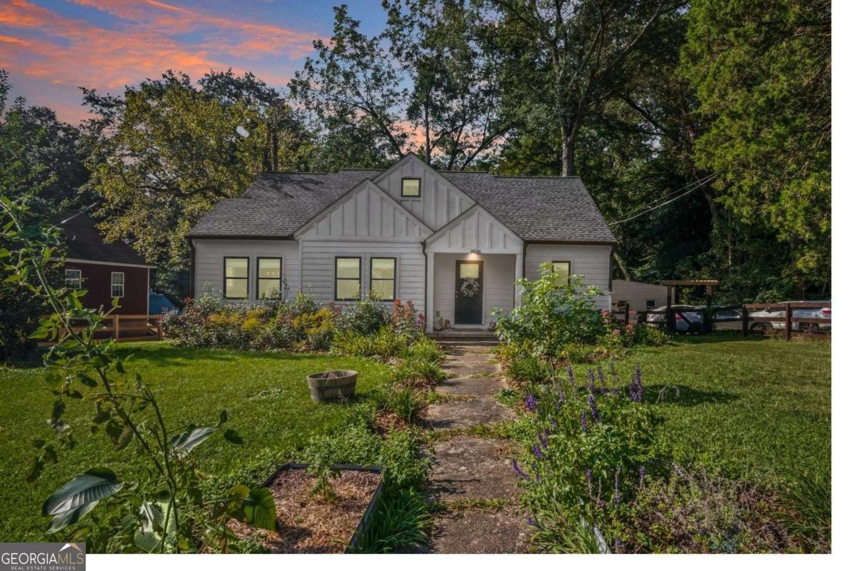 PERFECT OPPORTUNITY FOR A SAVVY BUYER OR INVESTOR! Drive up and instantly feel the welcome! Beautiful fenced yard, shed for storage, gardens, fruit trees, muscadine grape vines, flat usable large lot adorned with a large deck! Walk into an open floor plan with gorgeous hardwoods throughout, a separate dining area, huge living space with a classy accent wall, laundry room, MASTER ON MAIN, and closets throughout for ample storage! Oversized master bedroom features a large walk-in closet with lots of natural sunlight. The master bath suite is complete with a double vanity, double-headed shower, subway tile surround, and marble tiled floors! The kitchen is complete with granite, an upscale vent hood, a gas stove, a double stainless steel sink, subway tiled backsplash, stainless steel appliances, and a breakfast bar! This 4-bedroom / 2.5 bath gem offers large secondary bedrooms and lots of natural light! Hardiplank siding. Rainwater system. New Roof. Great location! Walk to the golf course and Adams Park!