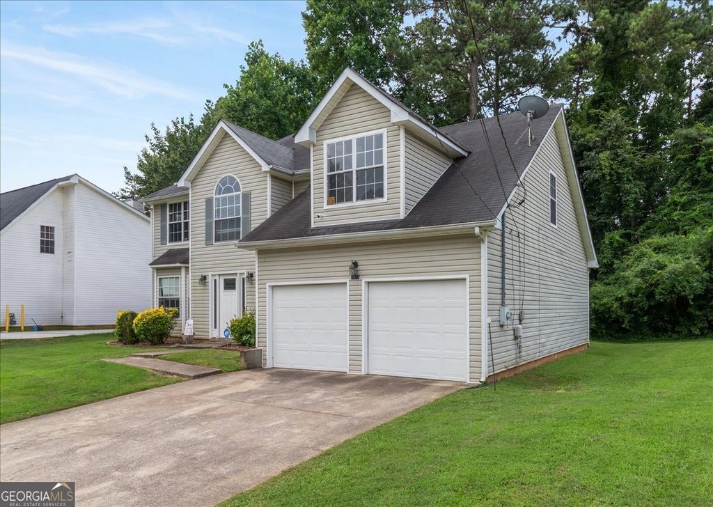 Photo of 7071 Deshon Hills Lane, Lithonia, GA 30058 (MLS # 10632719)