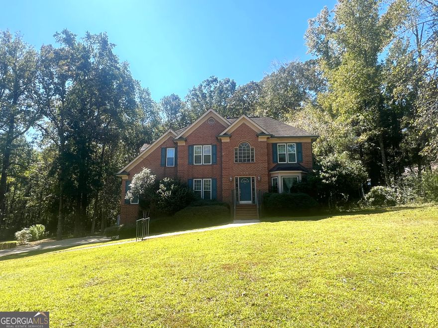 Large traditional home with partial finished basement.  Features beautiful 2-story foyer, 4 bedrooms, 3 1/2 baths, Master suite on main level, walk in closet, large master bath with double vanities, soaking tub and separate shower. Family room with vaulted ceiling and fireplace. Separate den and dining room. Kitchen with eat in breakfast area and loads of natural light from all the windows, all appliances remain.  Bonus room and full bath in basement. 2 car garage with lots of storage. Back deck overlooks a large back yard. New Heating and Air units with smart thermostats and a 10-year warranty (2025).  New garage door motors and track (2024).  Gutters with leaf guard system.