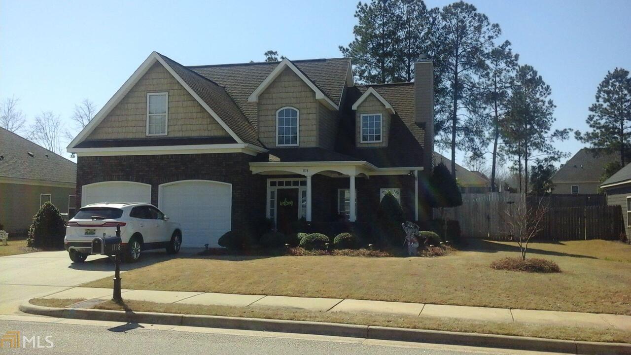 This immaculate home is located in Stephens Woods Subdivision. Walk in the foyer entrance into the open great room with gas log fireplace, dining room and kitchen. The large master suite is located on the main floor and the master bath includes double vanities, jacuzzi tub and separate shower. Features include hardwood floors, ceramic tile, carpet, new stainless steel appliances, granite countertops and vaulted ceilings. Beautifully landscaped backyard perfect for entertaining with patio areas and salt water inground swimming pool with fountain. Wired workshop/pool house and privacy fence. Irrigation system in front and back yard. A must see!