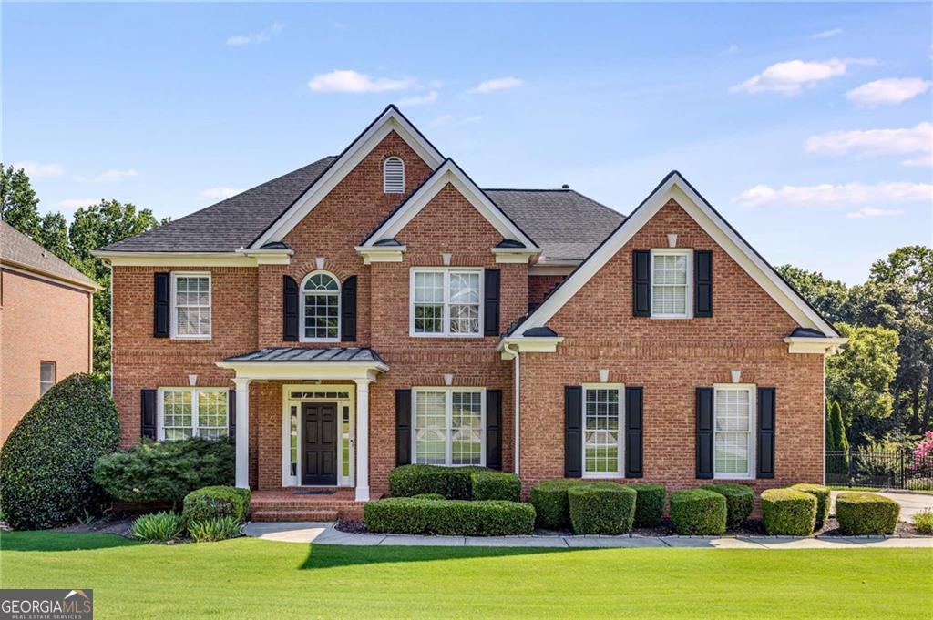 Experience luxury living on the golf course in this beautifully maintained home, nestled in a desirable HOA community with top-tier amenities! Enjoy access to a clubhouse, fitness center, pool, tennis and pickleball courts, playground, and more-perfect for active, social living. This property also features its own private pool, offering the ultimate space to relax or entertain. Inside, you'll find soaring 10-foot ceilings, elegant crown molding, and hardwood floors that flow through the main level. The open-concept kitchen features a gas cooktop, double ovens, and a breakfast area overlooking the spacious family room with a cozy gas-starter fireplace. Step outside to a private yard, front porch, and patio designed for comfort and connection. Upstairs, spacious bedrooms offer walk-in closets and luxurious baths with double vanities and ceramic tile. The fully finished basement expands your living space with endless possibilities for a media room, gym, office, or guest suite. With a 2-car garage, modern upgrades, and stunning golf course views, this home delivers comfort, style, and vibrant community living all in one!