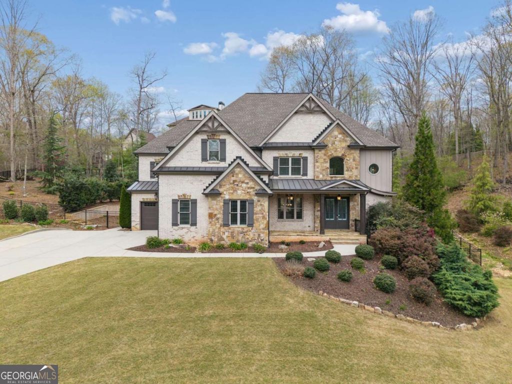 Photo of 5055 Pointer Ridge, Flowery Branch, GA 30542 (MLS # 10723159)
