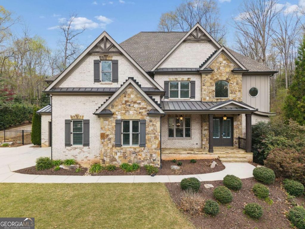 Photo of 5055 Pointer Ridge, Flowery Branch, GA 30542 (MLS # 10723159)