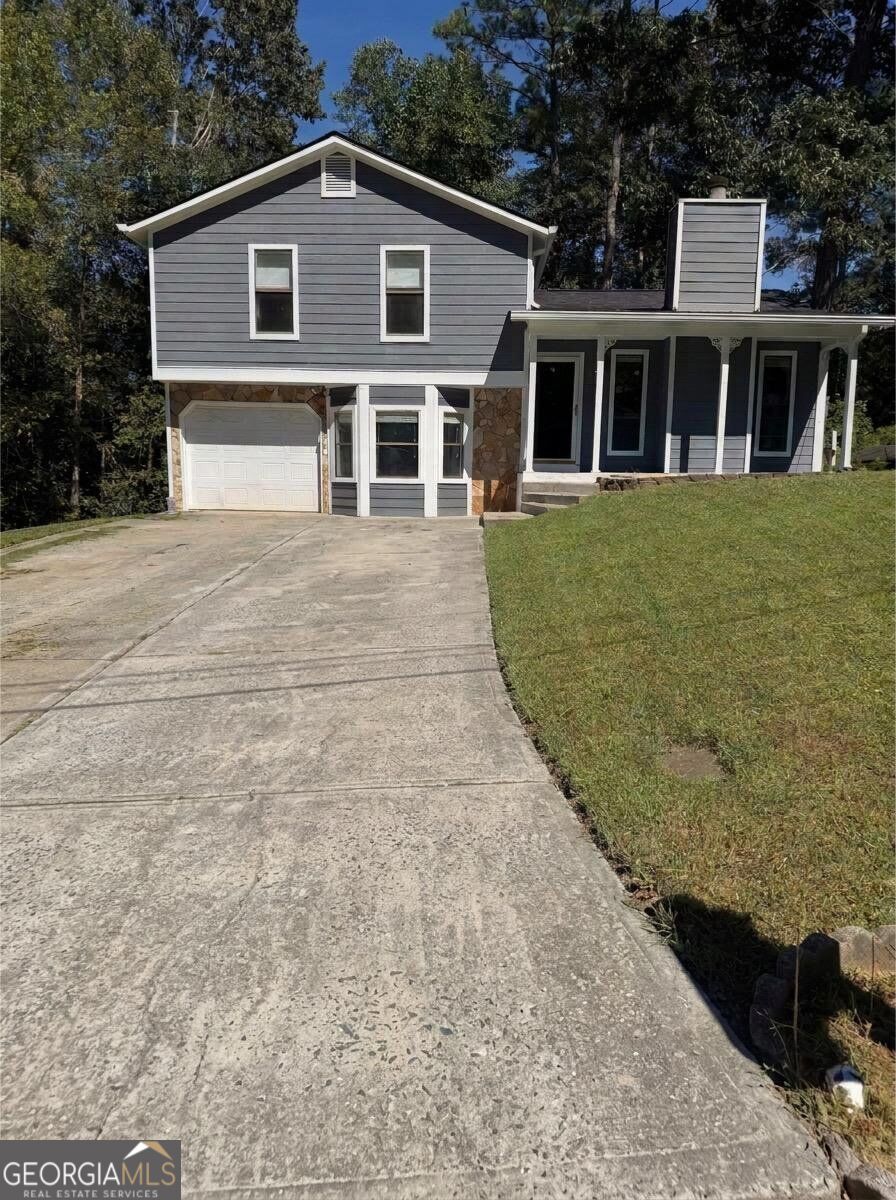 Photo of 64 Timothy Lane NW, Lilburn, GA 30047 (MLS # 10853948)
