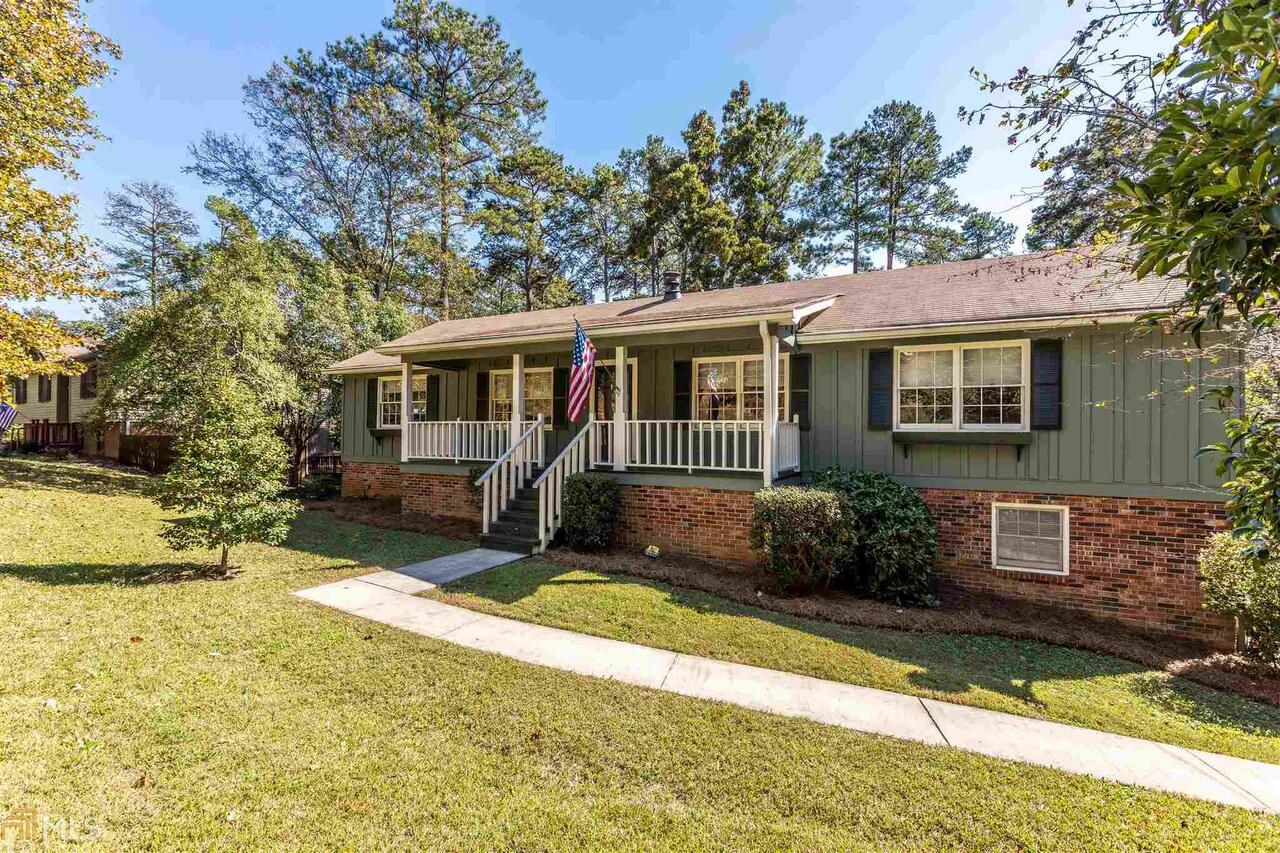 Recently remodeled ranch style home with a finished basement and huge screened- in porch. Large family room and formal dining room. The basement features a den/bedroom with a fireplace, additional bedroom, full bath, workshop area and 2 car garage with remote. The screened-in porch has a remote control ceiling fans and vent hood so you can cookout regardless of the weather. This house was remodeled for the owner's daughter. She found that someone special and has moved out. Good for her, even better for you. You'll love the open kitchen/dining area, wooded back yard and remodeled kitchen. Vacant on lockbox, so its easy to show.