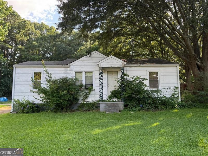 Investor Special in Prime Smyrna Location! Located in the sought-after 30080 zip code, this property sits on a great lot with multiple exit strategies. Renovate the existing structure and add square footage, or tear down and build new-new construction and renovated flips in the area are selling $500k+. Minutes from Truist Park, shops, dining, and major highways. Don't miss this opportunity to capitalize on a hot market with strong comps and high demand!