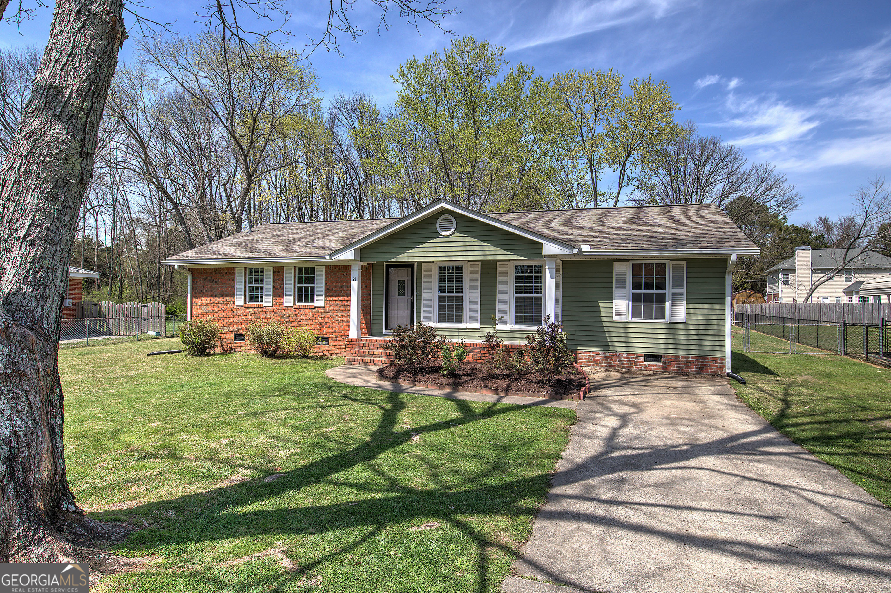 This 4 bedroom brick and vinyl ranch home is cute as a button and move in ready! Located in a well established family friendly neighborhood and in the well desired Model school district. The fenced in back yard is perfect for entertaining on the deck and plenty of room for the kids and pets to play. New roof, flooring and paint throughout make this adorable property priced to sell and waiting for the perfect family to make this lovely place their home.