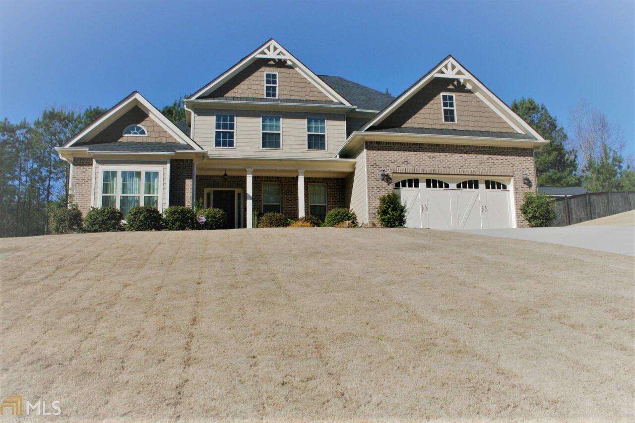 Great location!! Exceptional floor plan!! Main level offers stepless entry, LVP flooring through out common area with tile in wet areas. Huge master suite with sitting area, his and hers closets and vanities, separate shower and soaking tub. Also tucked away on main is a Second bedroom and full bath. Gathering room w/ fireplace. Kitchen with view to gathering room features granite, stainless appliances, island and pantry. Screen porch over looking backyard can be accessed from Breakfast Room. Upper level boast two additional bedrooms, bath, a generous bonus room with endless possibilities (play room, exercise, theater room, crafts - yours to imagine) and loads of storage. Hard to find "Ranch" with all the benefits of a two story.