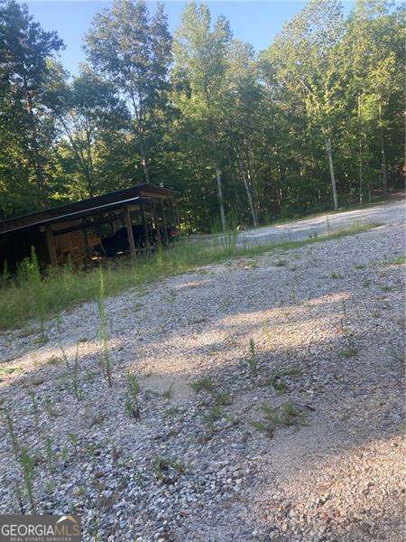 8 Acres which for room to spread out. Road is cut and it's ready to either be developed or subdivided. Currently one lot, may be able to be subdivided, has a small stream on the property. There is a stream. A great piece of property is someone wants a lot of privacy and a great building lot.