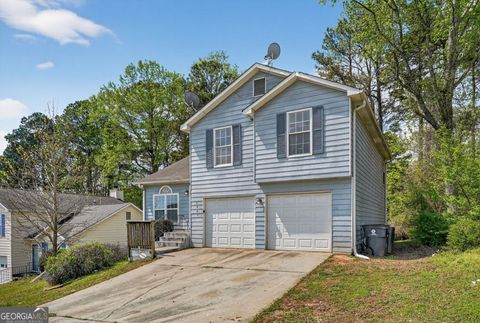 Photo of 5605 Rock Shoals Way, Atlanta, GA 30349 (MLS # 10721582)