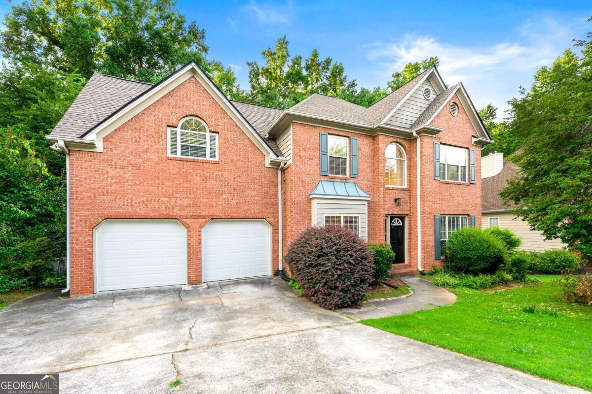 Welcome to 2004 Township Dr, Woodstock, GA 30189 This beautiful home in desirable Woodstock offers: * 4 bedrooms, 2.5 bathrooms * Approx. 2,446 sq ft of living space * Spacious main floor with updated flooring * The kitchen features granite countertops and stainless appliances * The unfinished basement offers plenty of space for storage, additional living space, or a recreation area * 2-car garage * Close to, parks, and shopping * Easy access to I-575 Don't miss this charming Woodstock home in a prime location. Schedule a showing today!