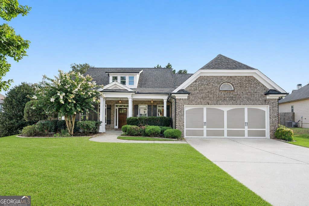 Photo of 210 Misty Grove Drive, Loganville, GA 30052 (MLS # 10820574)