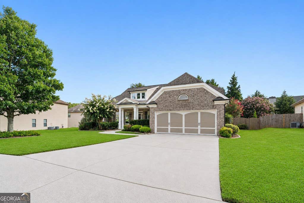 Photo of 210 Misty Grove Drive, Loganville, GA 30052 (MLS # 10820574)