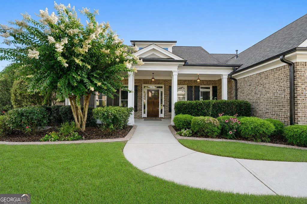 Photo of 210 Misty Grove Drive, Loganville, GA 30052 (MLS # 10820574)