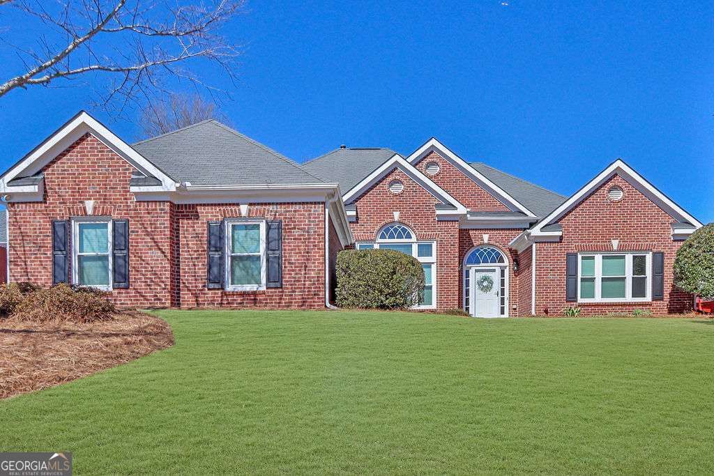 Photo of 1040 Lewis Ridge Circle, Lawrenceville, GA 30045 (MLS # 10693939)