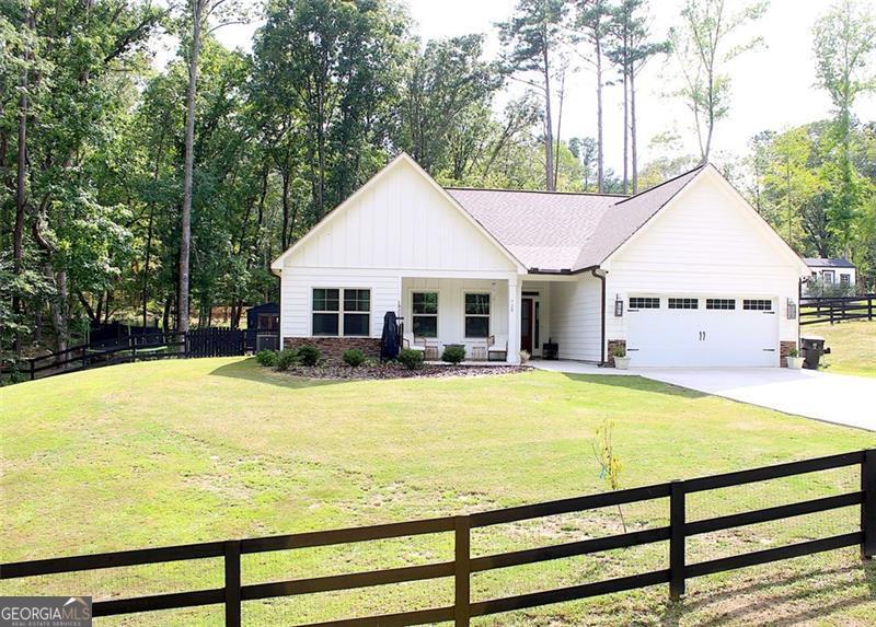 WELCOME HOME to your Beautiful RANCH/CRAFTSMAN STYLE HOME!! One Level living at it's best! OVERSIZED, main level Owners Suite, with Office, Nursery, SITTING ROOM or Workout space. You will love it! Granite countertops in Kitchen and both Baths! Home offers a covered FRONT and BACK PORCH. Perfect for RELAXING and enjoying your morning coffee. The backyard has room for a GARDEN, HAMMOCKS, and even a pool! Owner fenced the front and backyard, adding a gate at the front driveway. Home is less than 1 mile from Mulberry Rock Park, offering a play ground, picnic tables and WALKING TRAILS! Minutes to shopping, restaurants and Downtown fun. Schedule your tour of this great home, today!