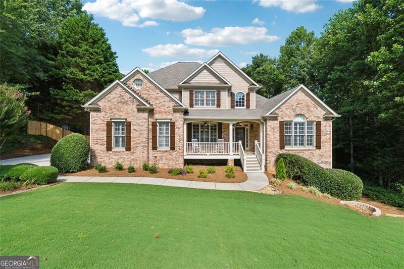 Welcome to 202 Brooke Place - a beautifully upgraded 4-bedroom, 4.5-bath home with a finished basement, located on a quiet cul-de-sac in one of Canton's most desirable swim and tennis communities. Ideally situated just minutes from I-575 and Northside Hospital, this home blends luxury, privacy, and convenience. Step into your own resort-style retreat featuring a heated saltwater pool with beach-entry, PebbleTec, spa jacuzzi, waterfall, and a cool deck surface that stays comfortable underfoot, even on the hottest days. The backyard is a showstopper - fully fenced with a privacy fence, maintained by a full irrigation system. Plus, you own beyond the fence line on the right side, giving you even more usable space. Inside, the home is loaded with upgrades: * Primary suite on the main level * Guest suite upstairs with private bath * Jack-and-Jill bedrooms with shared bath * Finished basement with living area, full bath, and included appliances * Built-in Pestban system * Whole-home intercom * New attic insulation * Fresh interior and exterior paint * New architectural roof * Washer and dryer stay All kitchen appliances stay, and the basement offers flexible space ideal for entertaining, a home gym, movie room, or office. This is a rare opportunity to own a move-in-ready home with high-end upgrades, exceptional outdoor living, and unmatched privacy - all in a prime location. Schedule your private tour today!