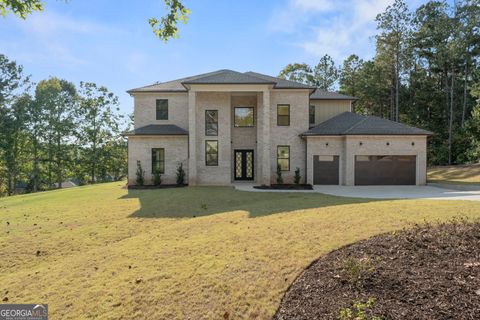 Photo of 5011 Colton Run, Atlanta, GA 30349 (MLS # 10601325)