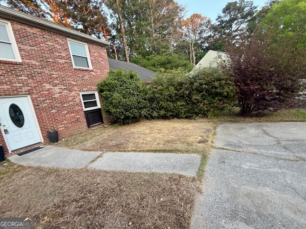Photo of 397 Patrick Henry Court, Riverdale, GA 30274 (MLS # 10756456)