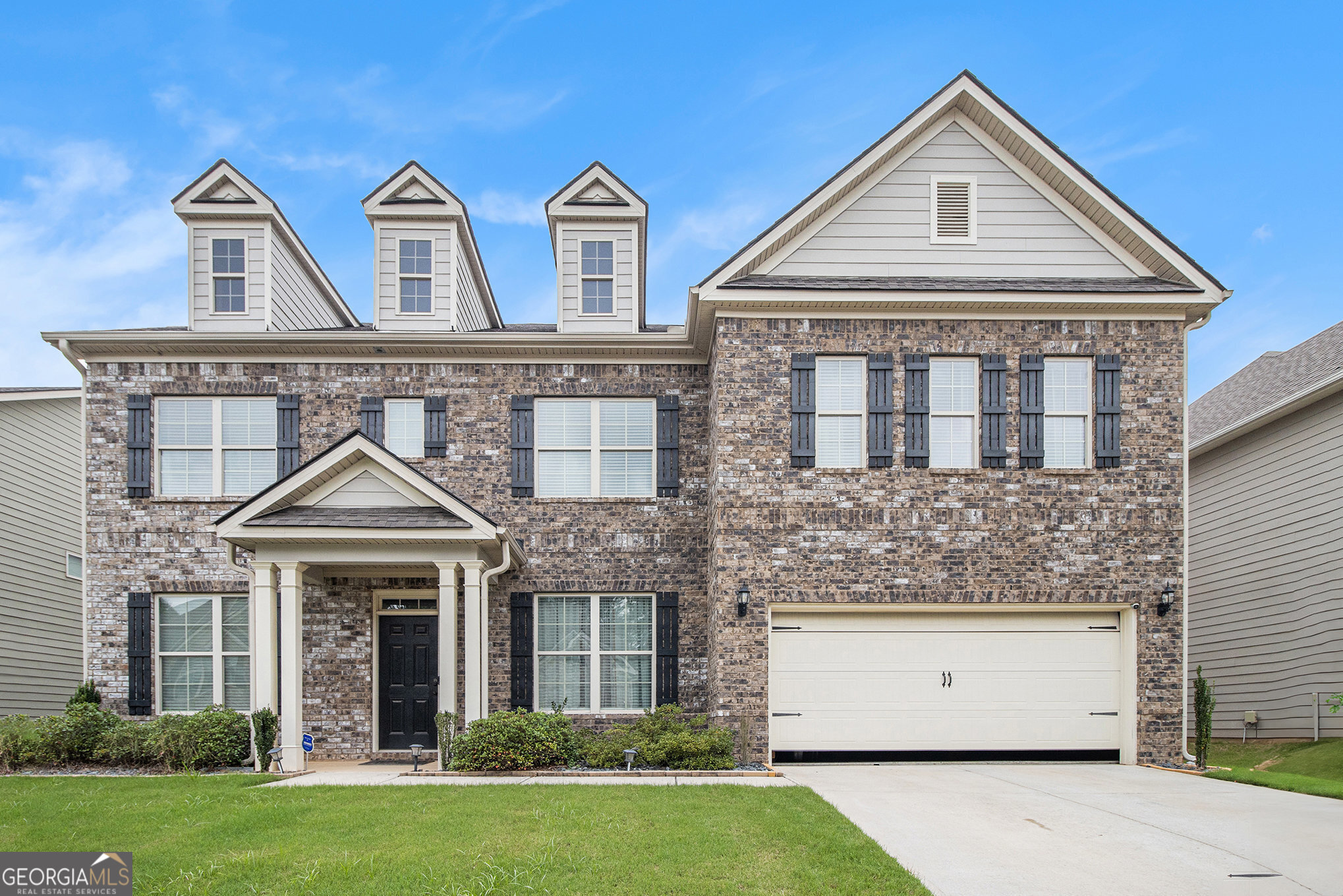 Elegant Lakefront Living with Golf Course Scenery! Step into your ideal residence in the coveted Brookhaven at Durham Lakes neighborhood! This immaculate 5-bedroom, 4-bathroom home with refined living space, thoughtfully crafted for contemporary living and entertaining. Constructed in 2019, this front faced brick home has been lightly occupied. At the heart of the home lies a chef's kitchen adorned with crisp white cabinetry, double ovens, a generous center island, and an open-concept design that connects effortlessly to the spacious great room-ideal for social gatherings or cozy family evenings. Unwind in the expansive owner's suite, set apart by a split floor plan for enhanced privacy. The luxurious ensuite bath delivers a spa-like atmosphere, complemented by a large walk-in closet with abundant storage. Private fenced backyard is enhanced with covered deck.