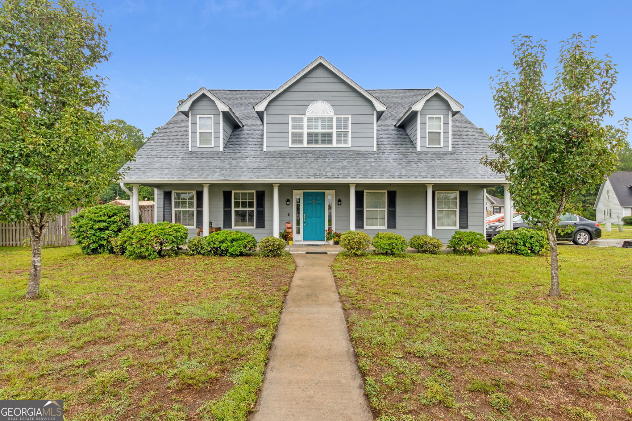 Welcome home to this spacious two-story beauty with 5 bedrooms and 3 bathrooms and a blend of comfort and functionality. The primary suite is located on the main floor with a freshly painted en suite featuring a soaking tub, separate tiled shower, double vanities, and a generous walk-in closet. An additional bedroom and a full bath are also on the main floor, giving flexibility for guests or office space. The best part is the unique "country kitchen" layout-one of only a few in the entire neighborhood! With an eat-in breakfast nook, expanded countertops, abundant cabinets, laminate surfaces, and tile flooring, this kitchen is built for gathering. The main living areas feature wood-look tile for durability and style, while bedrooms and the upstairs loft enjoy cozy carpet. Upstairs, a charming loft with custom built-in bookshelves tucked into the staircase, perfect for book nerds or display space. Three additional bedrooms share a full bathroom, with one bedroom featuring a custom closet complete with built-in shelving. Recent updates include a new roof (2024) and new carpet (2024), offering peace of mind for years to come. Outside, the fully fenced backyard is designed for both fun and function, featuring a fire pit area and three sheds (all purchased in 2023) to cover all your storage needs. This home stands out with its distinctive layout, abundant space, and upgrades throughout. Located on a cozy little cul-de-sac. If you've been searching for a place that feels both welcoming and well cared for-this is it!