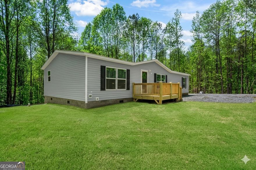 Brand new 2025 construction in the heart of Ellijay! This 3 bed, 2 bath home offers 1,568 sq ft of one-level living on a private 1.51-acre lot with a level backyard and no HOA. The open floor plan features a spacious living room, oversized kitchen island, custom cabinets, stainless steel appliances, walk-in pantry, and generous dining area. The primary suite includes a large walk-in closet and en-suite bath with stand-up shower and built-in storage. Durable vinyl flooring throughout, large laundry room, and great closet space in secondary bedrooms. All new systems including well, septic, HVAC, driveway, and utilities. Central electric heating and cooling. Cable, high-speed internet, electricity, and phone available. Located less than 3 minutes from B.J. Reece Orchards & Reece Cider Co., close to local vineyards and Amicalola Falls, and just 15 minutes to Downtown Ellijay. Light deed restrictions apply - see documents. Estimated completion January 2025. Move-in ready soon-secure it before it's gone! On a permanent foundation.