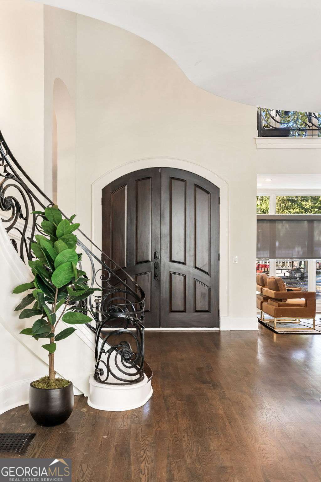 Step inside this 10,000+ sq ft gated masterpiece in the heart of Buckhead and experience Atlanta luxury at its finest. Every detail exudes sophistication - from the marble-clad interiors to the indoor pool oasis that defines resort-style living. Designed for grand entertaining, the home features a chef's kitchen with an oversized island, a poolside full bar, and an intimate theater room. The main-level primary suite is a private retreat with pool views, dual marble baths, and boutique-style closets. Multiple balconies and patios invite seamless indoor-outdoor living, while 4 garage bays, ample guest parking, and comprehensive surveillance deliver comfort and peace of mind. This isn't just a home - it's a lifestyle of elegance, privacy, and prestige in Atlanta's most coveted neighborhood.