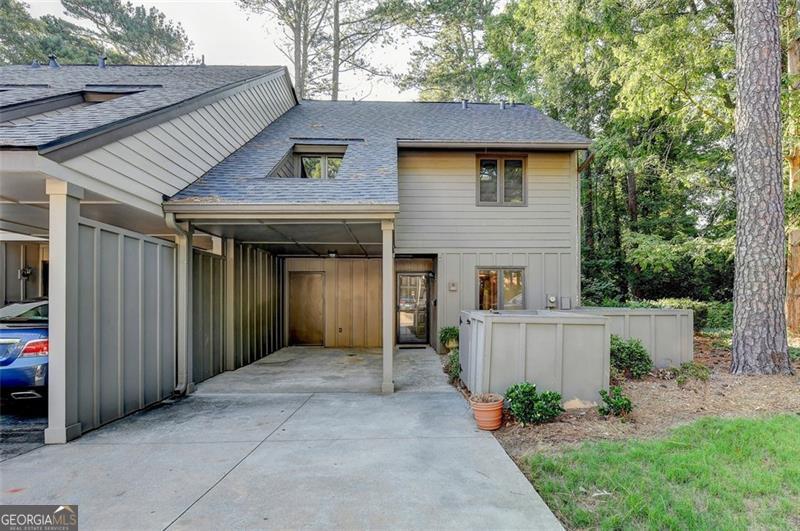 !!Motivated Seller!! | Offering $10,000 in Closing Cost to qualified buyer with a reasonable offer | Must Close with Supreme Lending in the next 45 days. | Supreme Lending offers a "conventional 30 yr fixed loan" with as little as 3% down, competitive rates and full underwriting approval within 7-10 days.| Act now! Charming End-Unit townhome with private outdoor oasis in sought after community of Cedar Canyons off Powers Ferry in East Cobb. This condo is conveniently located to I-75/I-285, dining, shopping and minutes from Truist Park. One of the more unique floorplans in the neighborhood with its 10' great room ceilings, expansive windows that flood the space with natural light & a beautiful spiral staircase that adds charm and sophistication to the heart of the home. Step outside to a private brick enclosed patio off the great room and dining area that opens to a serene wooded backyard. 3 Bedrooms upstairs, 1 to include built in desk/bookshelves for your Home office needs. Newer Roof(3 years old), HVAC system( Replaced 2020/2022), entire unit painted to include all doors, ceilings, walls and trim, all plumbing replaced and updated Faucets, lighting, toilets and all new LVP Flooring & carpeted stairs. The upstairs laundry room makes laundry day a breeze, while the half-bath on the main floor is perfect for guests.Plenty of Storage...Attic space & a Storage room with built in workspace/shelves off of the carport. This home offers the perfect combination of unique architectural details, practical living spaces, and peaceful privacy. Don't miss your chance to own this unique property- Schedule your private tour today via Showing time. Appointment only .