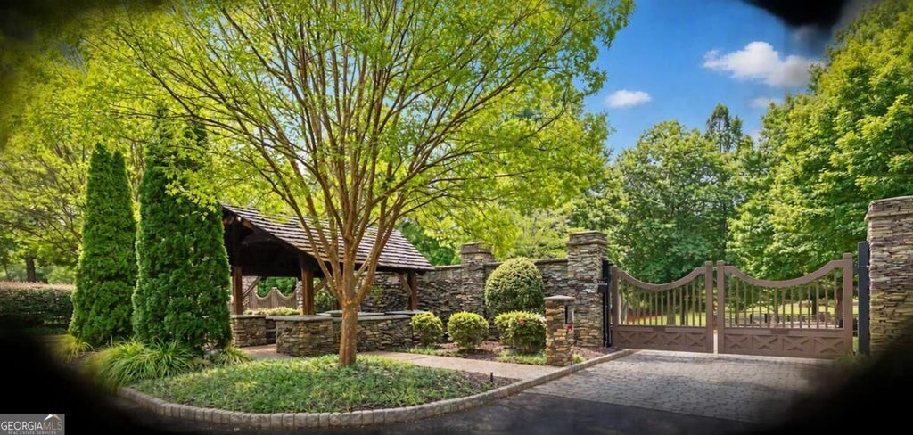 Photo of 421 River Bluff Lane, Ball Ground, GA 30107 (MLS # 10854537)