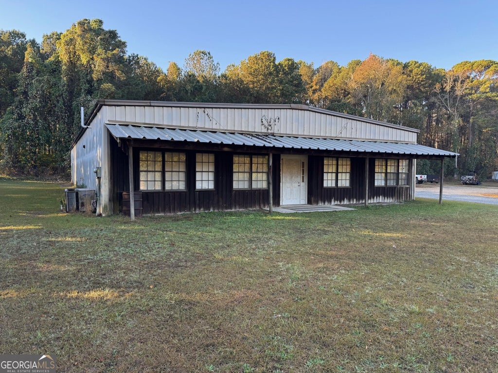 Photo of 223 Sinclair Marina Road NE, Milledgeville, GA 31061 (MLS # 10845212)