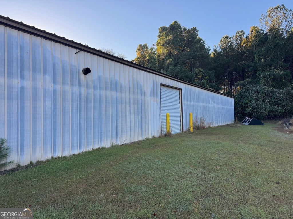 Photo of 223 Sinclair Marina Road NE, Milledgeville, GA 31061 (MLS # 10845212)