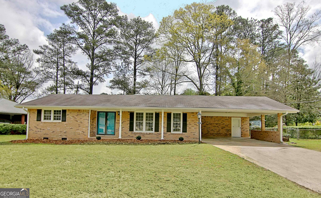 For Rent! Spacious Brick Ranch in Prime Location. This beautifully maintained 3 bed / 2 bath home offers over 1,800 sq ft of comfort and charm. Featuring updated flooring, a modern kitchen with stainless steel appliances, a cozy family room with a fireplace, and a bright all-season sunroom. Enjoy a lush backyard, extra storage, and a peaceful, no-HOA neighborhood-just 10 minutes from the airport and close to shopping, restaurants, and Amazon. Don't miss this rare rental gem-schedule your tour today!