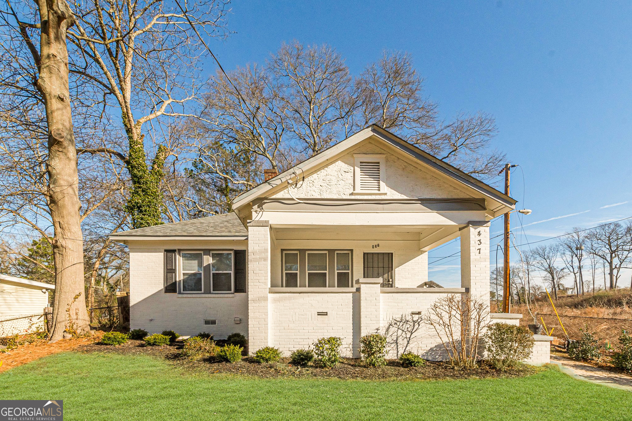 This remarkable renovation in the Grove Park Area presents a spacious, remodeled home with meticulous attention to detail. Featuring all-new roof shingles, comprehensive plumbing updates, refreshed electrical systems, and elegant hardwood floors throughout, the house is a blend of modernity and comfort. The interior boasts new, stylish bathrooms, granite countertops, chic vanities, and stainless steel appliances. Enjoy serene sunrises or unwind after a long day on the expansive front porch, and host memorable summer evenings in the vast backyard on a quarter-acre lot, perfect for endless entertainment possibilities. The home comprises 3 bedrooms and 2 full bathrooms, with the third bedroom being ideal for guests, a home office, nursery, or a versatile Flex room. Uniquely positioned next to the latest Atlanta Beltline Inc. acquisition, this property is at the forefront of significant affordable housing and business developments on the Westside of Atlanta. It's also conveniently close to the future 90-acre MICROSOFT campus, which will include trails linking to the Westside Beltline, Westside Reservoir Park, and the burgeoning Echo Street West development. Echo Street West is set to feature over 50,000Sq.Ft. of retail and dining options, more than 290 residential units, 30,000Sq.Ft. of office space, and over 6.5 acres of outdoor entertainment areas. Additionally, its proximity to Georgia Tech University enhances its appeal. This is a rare opportunity to invest in the rapidly expanding Westside of Atlanta, an opportunity that shouldn't be missed!