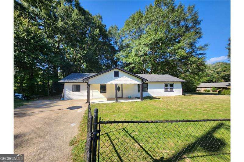 Cozy 3BR/1.5BA ranch in Powder Springs! Cul-de-sac lot with no HOA and fenced yard, perfect for pets or kids. Updates include renovated kitchen, new siding, gutters, windows, fresh paint, plus newer roof, HVAC, and water heater. Brand new porch too! Sold AS-IS-great for first-time buyers or investors!