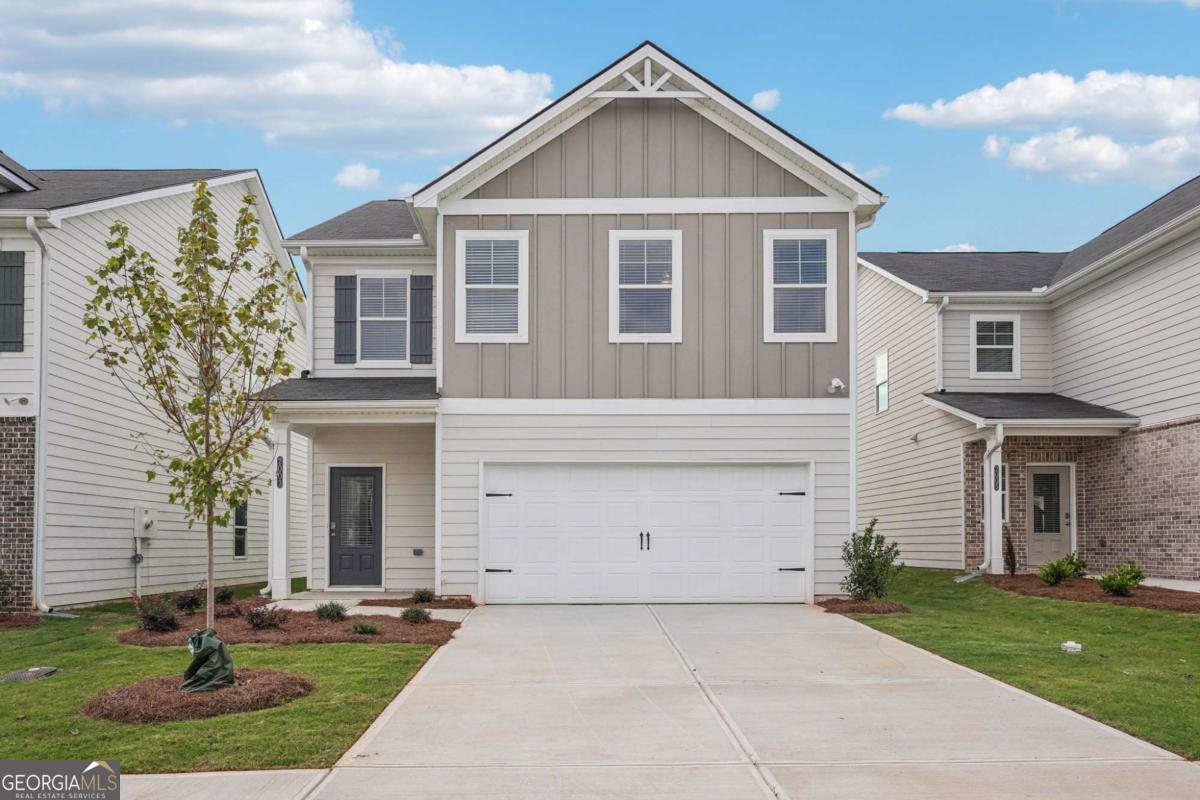 Welcome to the Lawson plan by Direct Residential Communities in Fairview Lake. The Lawson "C" plan is an inviting open concept. This inspiring floor plan has 3 Bedroom, 2.5 baths and 2 car garage. The extended entrance foyer offers an intuitive flow for creative wall space and opens up to the heart of the home - the family room, which features an impressive linear electric fireplace that captures genuine warmth and a fine balance of spaciousness! Energy efficient LED lighting throughout! A modern open galley style kitchen offers an expansive island bar with multifunctional use, under-mount stainless steel sink, granite counter-tops, stainless steel appliances, pantry and plenty of cabinets, a great place to work, prepare food and entertain! The upper level reveals functional livable hallway space. Over-sized secondary bedrooms with walk in closets are positioned near a full bath room. The Owner's suite offers a perfect blend of space that's complete with a luxurious bath, separate shower, glass shower door and separate tub with tile surround for the ultimate relaxation experience. Laundry room conveniently located on the upper level. This inspiring floor plan is where your story begins! Amazing amenities include a sparkling pool and cabana, beautiful private lake, and a pavilion for lakeside picnics! ***UP TO $20,000 TOWARDS YOUR CLOSING COST WITH PREFERRED LENDER!! ALSO ASK ABOUT OUR LIMITED TIME 100% FINANCING OPTIONS!!***