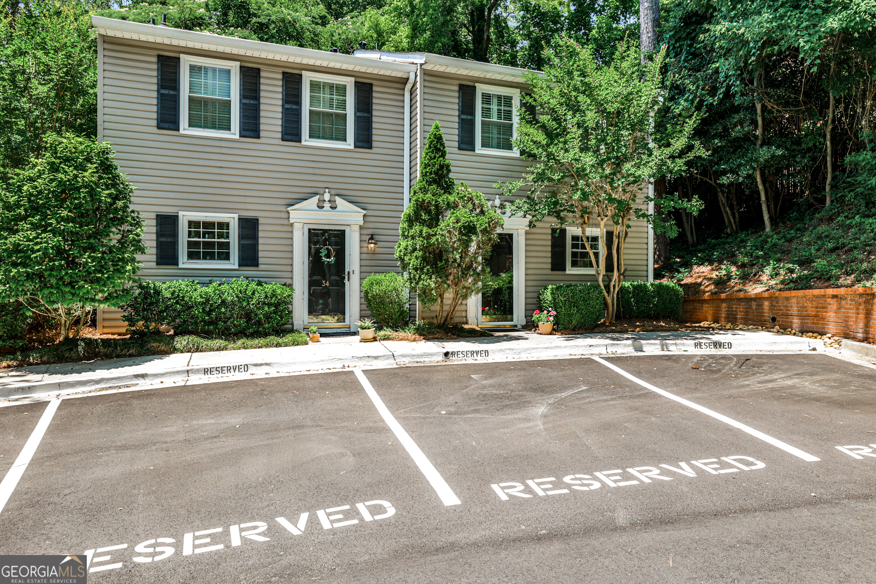 Location matters; not only is the 1750 Clairmont community close to the VA, Emory University, CDC, and Toco Hills with easy access to I-85 and 285, this end-unit townhome is perfectly situated at the back of the community, affording supreme privacy. Well-maintained home is ideal for roommates, with each bedroom having its own full bath. Large living/dining room on the main floor opens to private patio with mature trees providing welcome shade. Kitchen has plenty of room for one or more cooks to create culinary masterpieces. All appliances stay, including the washer/dryer! HVAC and water heater less than five years old. One reserved parking space in front with plenty of visitor parking. PRICED BELOW VALUE; come and get this great deal!