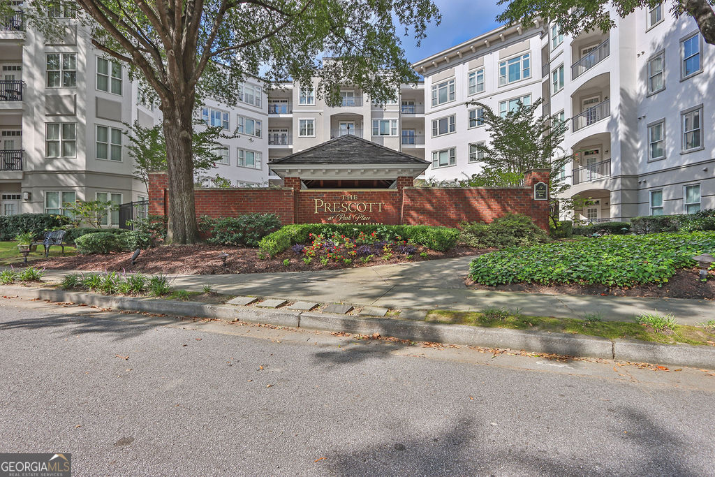 Don't miss this stylish 1 bed, 1.5 bath condo in the heart of Dunwoody. One of the few units in the community with a spacious patio overlooking the pool-a view that's especially beautiful at night when the water glows. Step inside to a welcoming foyer entrance, high ceilings, and an open layout filled with natural light. The living area features hardwood floors and a large window that brings the outside in. The kitchen is both functional and modern, with white cabinets, granite countertops, stainless steel appliances, and a convenient island perfect for meal prep or casual dining. The primary suite includes a large walk-in closet, and the en-suite bath features a double vanity, soaking tub, and a separate shower. This unit also comes with one assigned parking space and is just minutes from Dunwoody's best shopping, dining, and entertainment.
