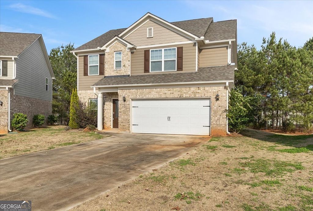 Photo of 192 Al Jennah Boulevard, Locust Grove, GA 30248 (MLS # 10672093)