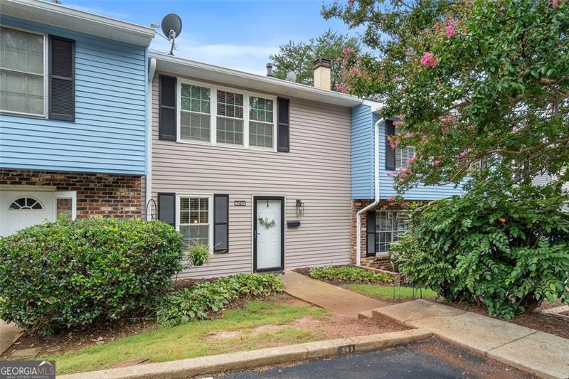 Welcome to 343 Leisure Court* Cute as a Button and Walking Distance to Tumlin Park which includes a Walking Path, Tennis and Pickle Ball Courts* This Condominium has 2 Years Young LVP Flooring throughout the home* Living Area has Ceiling Fan and Natural Light* Cozy Kitchen has Butcher Block Counters, White Cabinets, Tiled Backsplash, and Nice Stainless Refrigerator is included* A Powder Room is on the Main Level* Upstairs boasts 2 Spacious Bedrooms and a Full Bath* Extra Insulation has been added in the attic space* Rear concrete Patio for Sun Shiny Days and Grilling* 2 Designated Parking Spaces and Plenty of Guest Parking Just across the Parking Lot* A Community Pool is Close By* Great Price to be Close in to Marietta Square* Great for Investor, First Time Homebuyer or Anyone in Between* HOA Fees cover All Exterior Maintenance, Water, Sewer, Trash and Use of the Pool